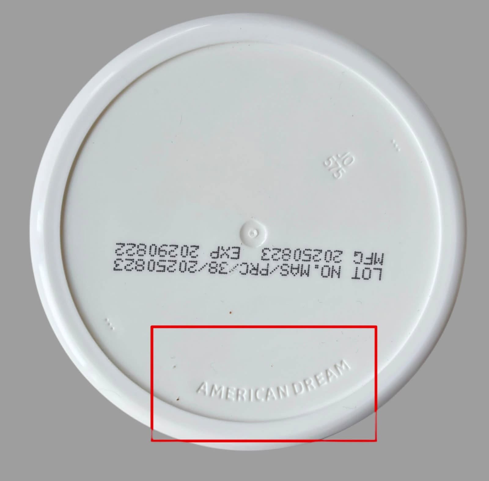 Bottom of a genuine American Dream jar, with AMERICAN DREAM embossed into the plastic